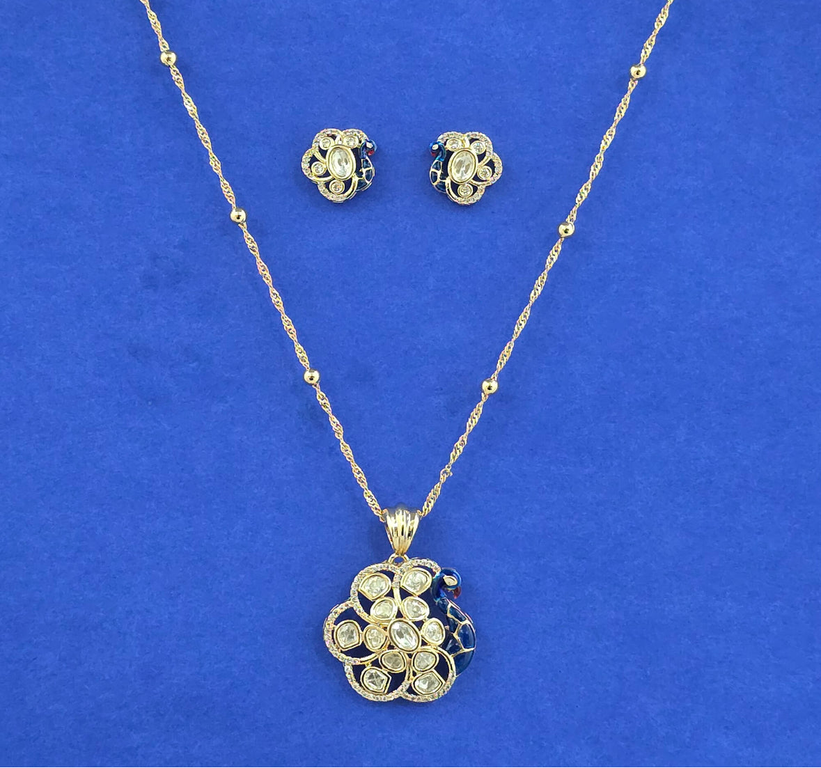 Kundan Peacock Design Pendant Set with Carat Gold Plating