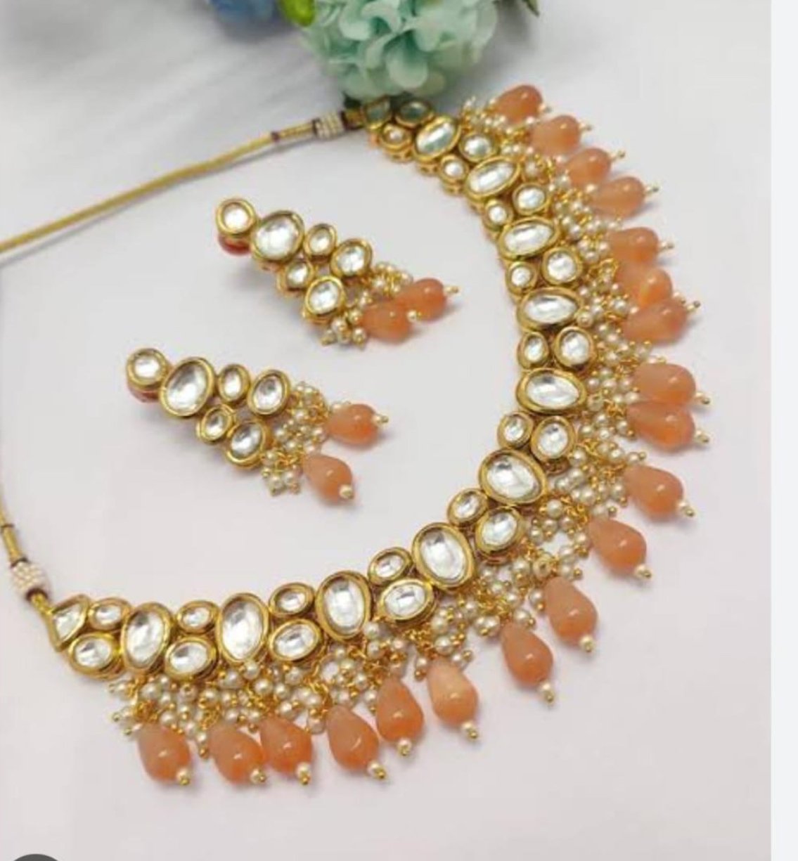 Elegant Kundan Jewelry Set with Peach Beads