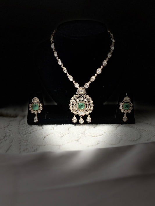 Elegant Kundan Jewelry Set with Green Accents