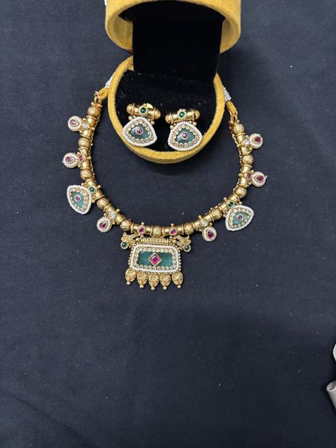 Elegant Kundan Jewelry Set with Earrings