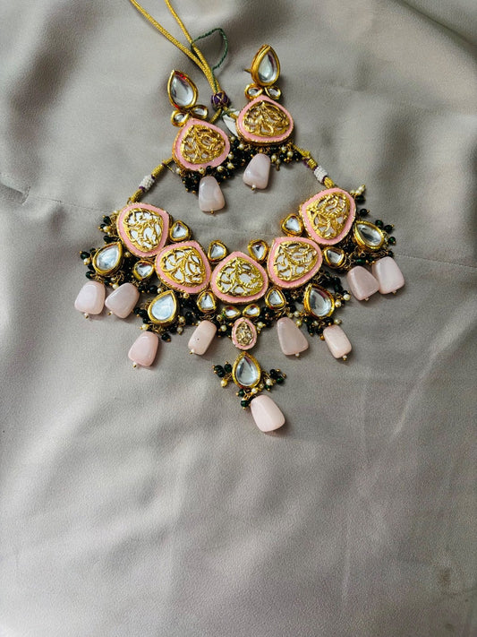 Elegant Kundan Jewelry Set with Pastel Accents