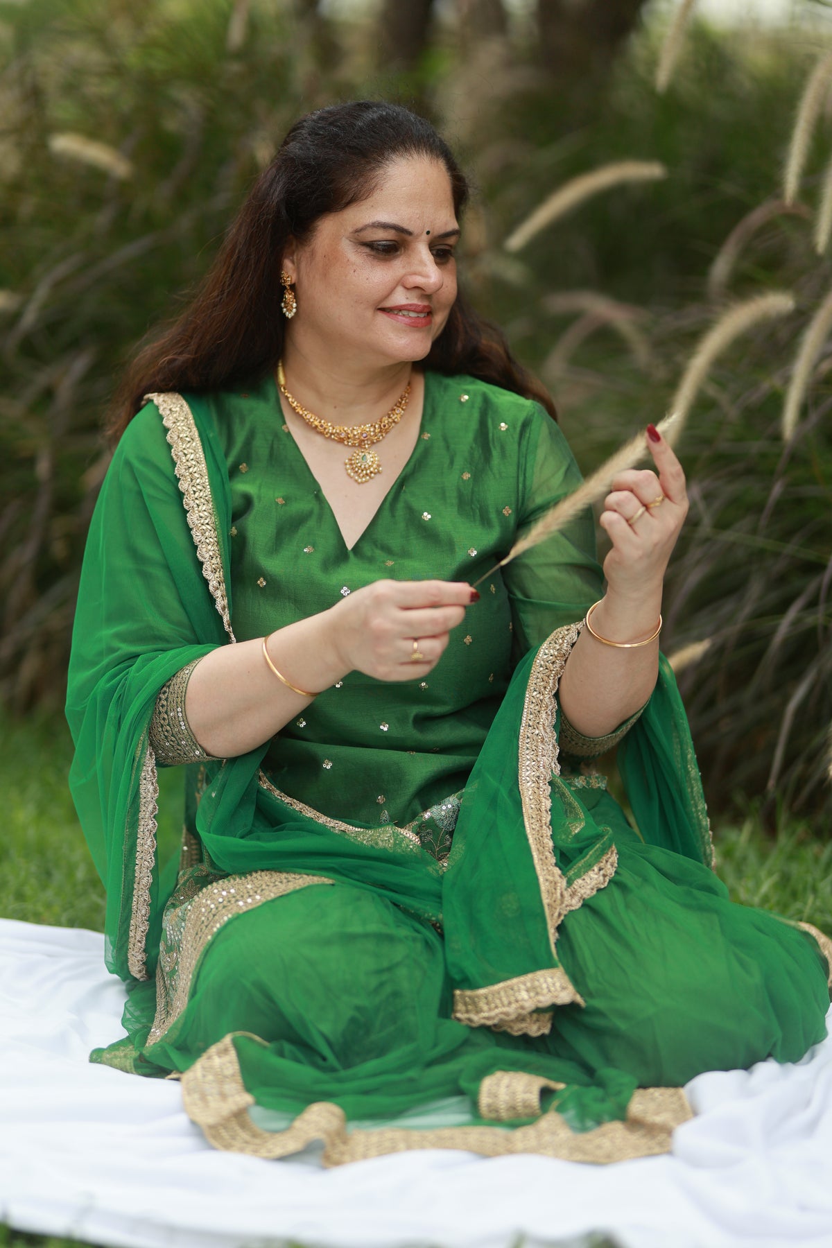 Hastak - Vibrant ruby and emerald-toned stones