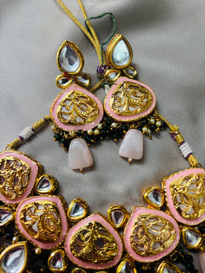 Elegant Kundan Jewelry Set with Pastel Accents