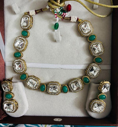 Kundan Jewelry Set with Green Accents
