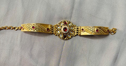 Antique Gold Plated Bracelet with Red Kundan Accents