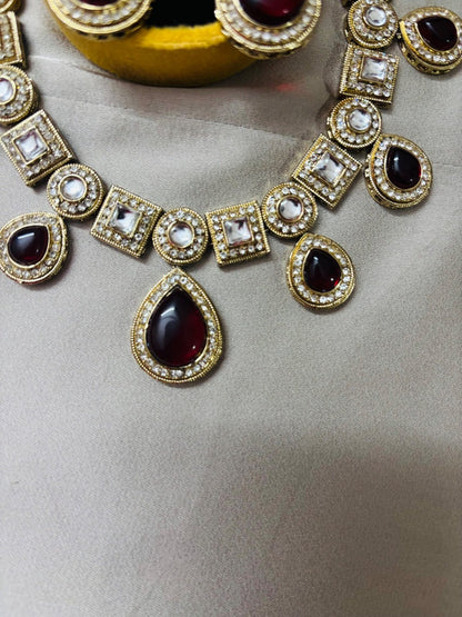 Kundan Set with Maroon coloured Doublets