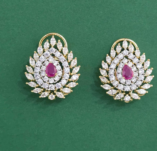 Zircon Studs With Rubi Colored Center Stone