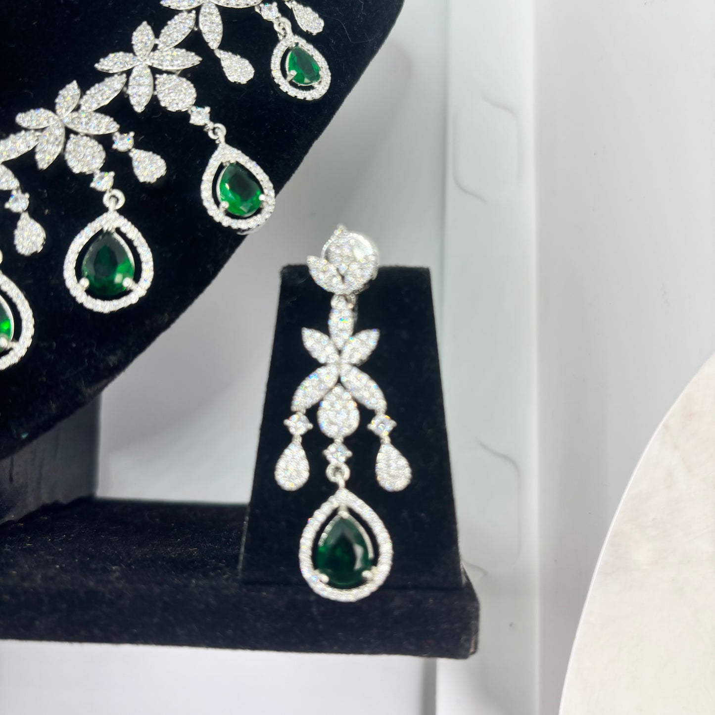 Intricate floral and leaf motifs crafted from brilliant-cut marquise crystals