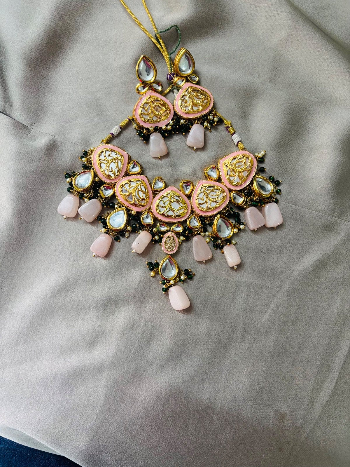 Elegant Kundan Jewelry Set with Pastel Accents