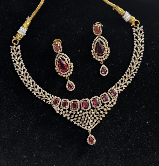 American Diamond Jewelry Set with Goldenish and Red Stones