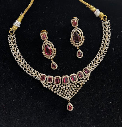 American Diamond Jewelry Set with Goldenish and Red Stones