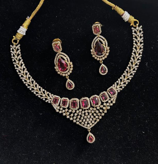American Diamond Jewelry Set with Goldenish and Red Stones
