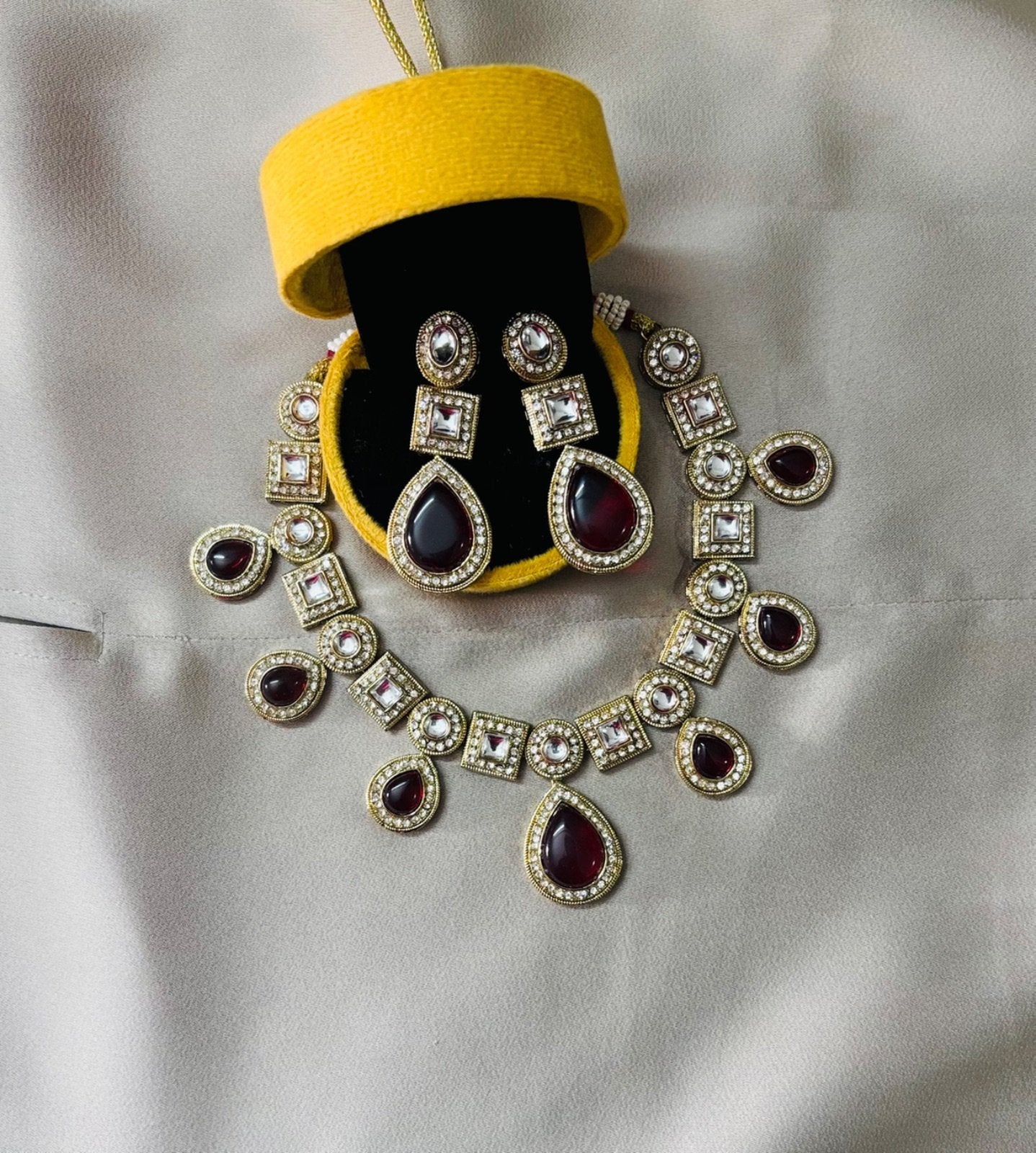 Kundan Set with Maroon coloured Doublets